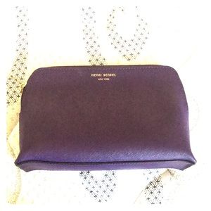 Henri Bendel dark purple makeup bag